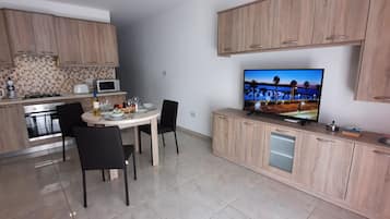 1 bedroom, premium bedding, blackout curtains, iron/ironing board