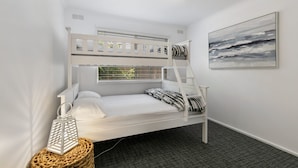 A bunk bed room with a window, a wall-mounted artwork, and a woven basket. - Beauty AND THE Peace - Inlet Side (Inverloch)