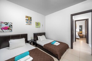 4 bedrooms, in-room safe, iron/ironing board, WiFi