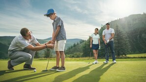 A golf course with players and a caddy. - Luxurious 1br+loft - Ski-in/ski-out Access To Beaver Creek 1 Bedroom Condo by RedAwning (Avon)