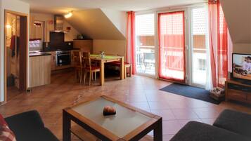 Family Condo, 2 Bedrooms, Non Smoking, Balcony | Living area | Flat-screen TV, ping pong