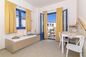 One Bedroom Apartment with Pool View | Living area | TV - Ilios Malia Hotel Resort (Hersonissos)