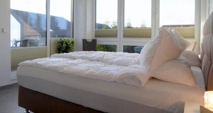 Dans le charmant appartement "Wind & Welle" avec un balcon orienté ouest, vous vous sentez comme chez vous
