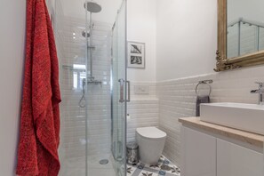 Hair dryer, towels, soap, shampoo