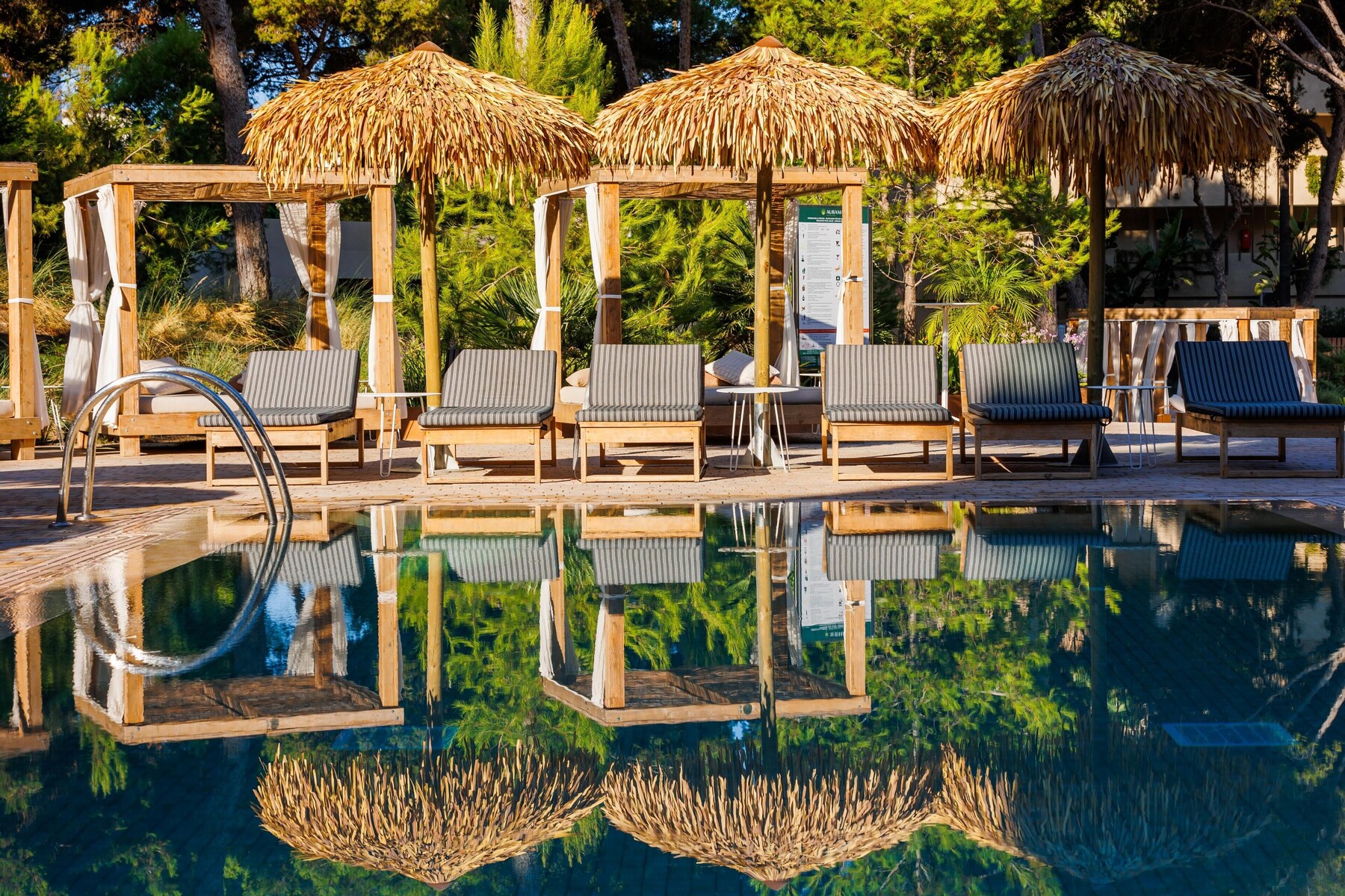 Indoor pool, 3 outdoor pools, open 10:00 AM to 7:00 PM, pool umbrellas