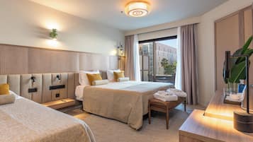 Premium bedding, down comforters, memory foam beds, minibar