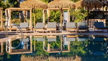 Indoor pool, 2 outdoor pools, open 10:00 AM to 7:00 PM, pool umbrellas