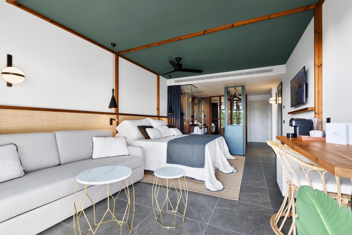 junior suite, balcony, pool view | 1 bedroom, premium bedding, down duvets, memory-foam beds