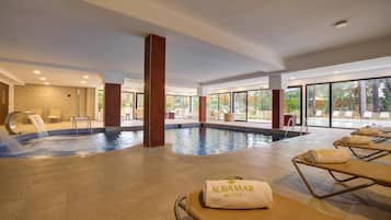 Indoor pool, 2 outdoor pools, open 10:00 AM to 7:00 PM, pool umbrellas