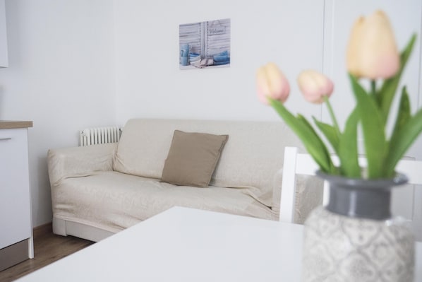 Departamento, 2 habitaciones | Área de sala de estar