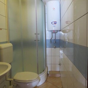 Toalhas de banho, papel higiênico