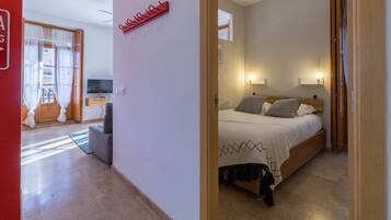 1 dormitorio, tabla de planchar con plancha, cuna de viaje y wifi