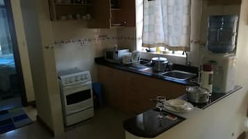 Classic Apartment | Private kitchen | Fridge, microwave, oven, stovetop