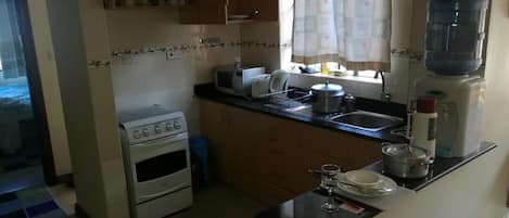 Classic Apartment | Private kitchen | Fridge, microwave, oven, stovetop