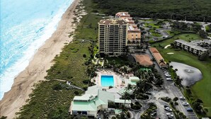 A resort with a beachfront, a swimming pool, and a golf course. - SS 81122 Expansive Ocean & Intracoastal Waterway View Condo - Vacation Rental in Ocean Village (Fort Pierce)