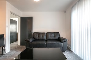 Apartment, 2 Bedrooms (4 Guests) | Living room | 18-inch LCD TV with digital channels, TV