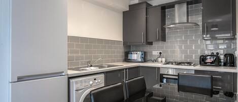 Apartment, 2 Bedrooms (4 Guests) | Private kitchen | Fridge, microwave, coffee/tea maker, electric kettle