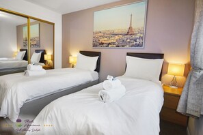 2 chambres, chambres insonorisées, fer et planche à repasser