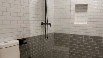 Shower, free toiletries, hair dryer, slippers