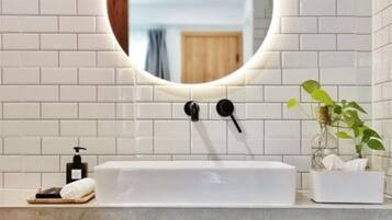 Shower, free toiletries, hair dryer, slippers