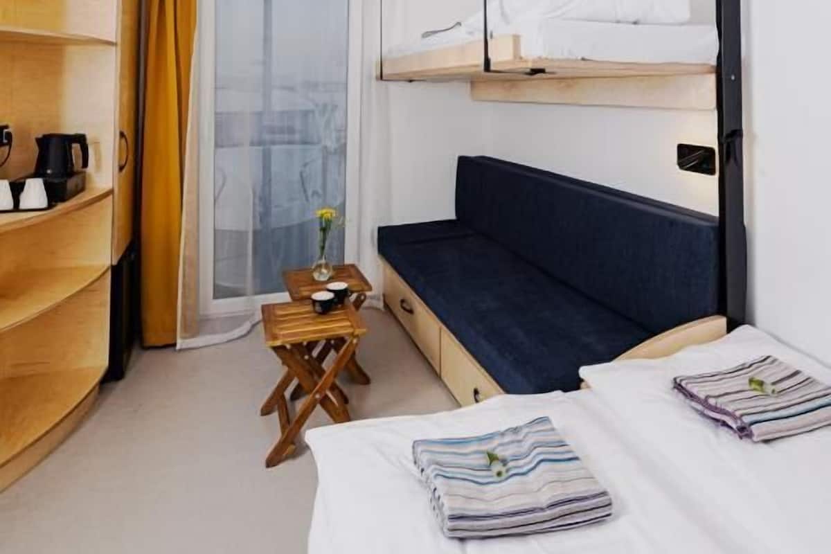Blackout curtains, soundproofing, free WiFi, bed sheets