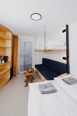 Blackout curtains, soundproofing, free WiFi, bed sheets