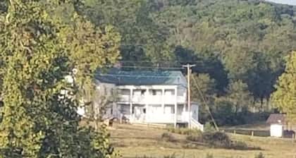 Luray farmhouse on the river