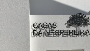A sign with the text "CASAS DA NESPEREIRA" and a tree silhouette. Below, there are three gas meter boxes. - New and complete house, 300 mtrs from Manta Rota beach (Vila Nova de Cacela)