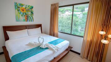 Luxury Condo, 3 Bedrooms, Pool Access, Partial Ocean View | 3 bedrooms, free WiFi, bed sheets