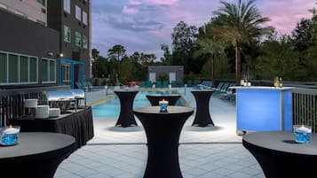 Outdoor pool, open 7:00 AM to 10:00 PM, pool umbrellas, pool loungers