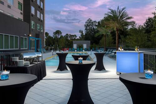 Outdoor pool, open 7:00 AM to 10:00 PM, pool umbrellas, sun loungers