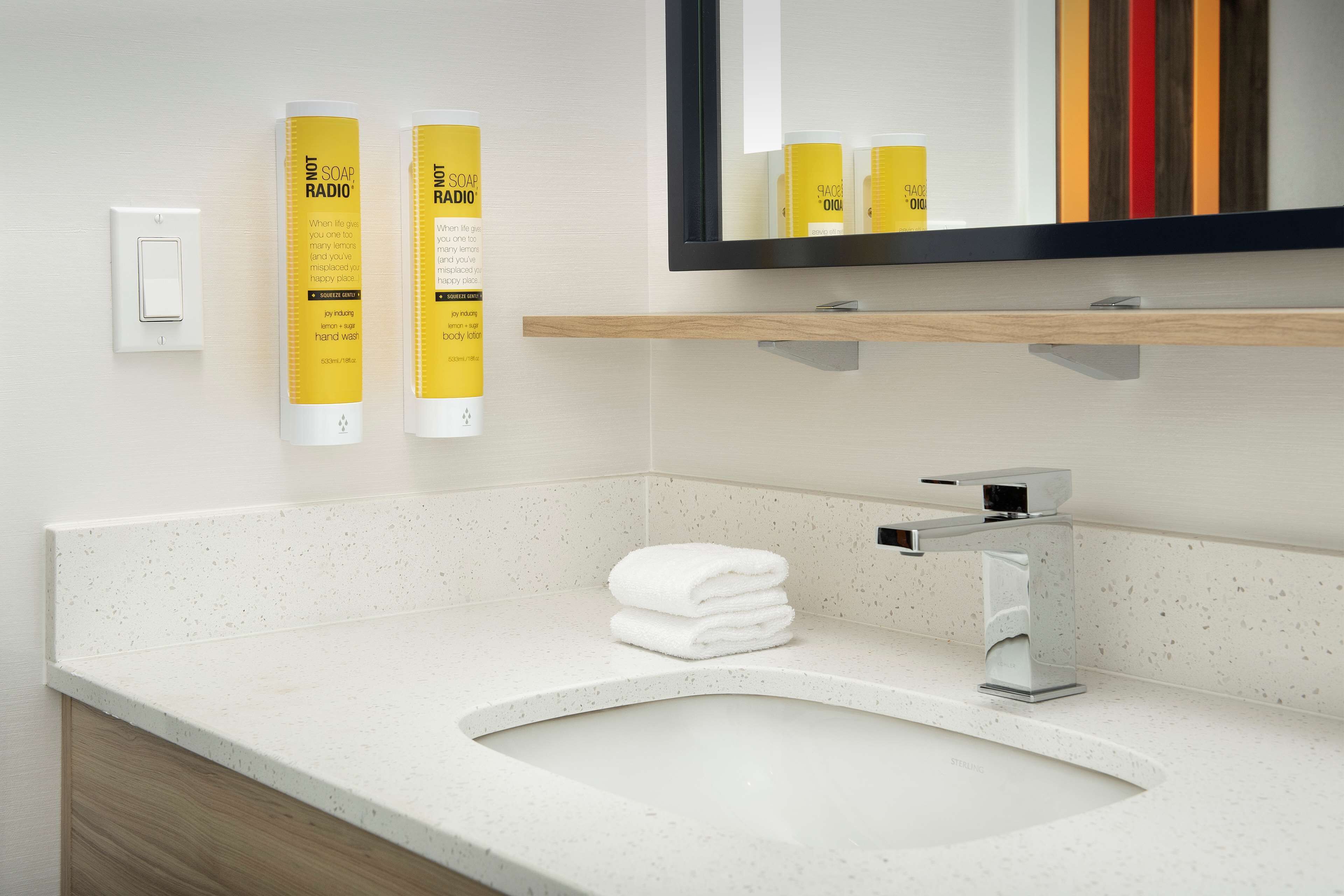 hydromassage showerhead, hair dryer, towels, soap