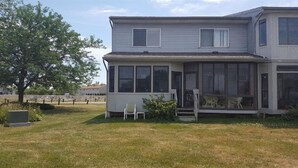 A two-story house with a large front porch and a covered patio area. - Great place for fisherman and bird watchers (Oak Harbor)