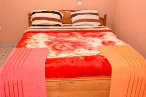 Blackout curtains, iron/ironing board, free WiFi, bed sheets - Eden Condo Hotel (Muhoza)