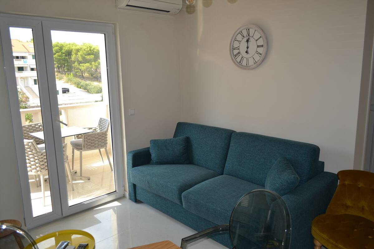 Apartment (1) | Living room | 120-cm LCD TV with cable channels, TV