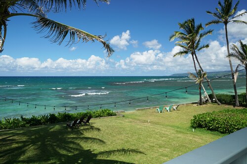 Perhe Beachfront Home ilmastoitu iso piha ja kansi