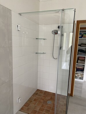 Combined shower/tub, hair dryer, towels, toilet paper