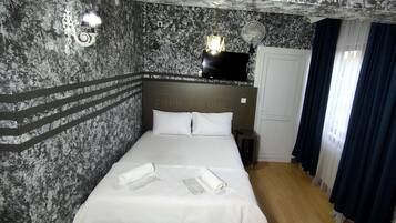 Blackout curtains, free WiFi, bed sheets