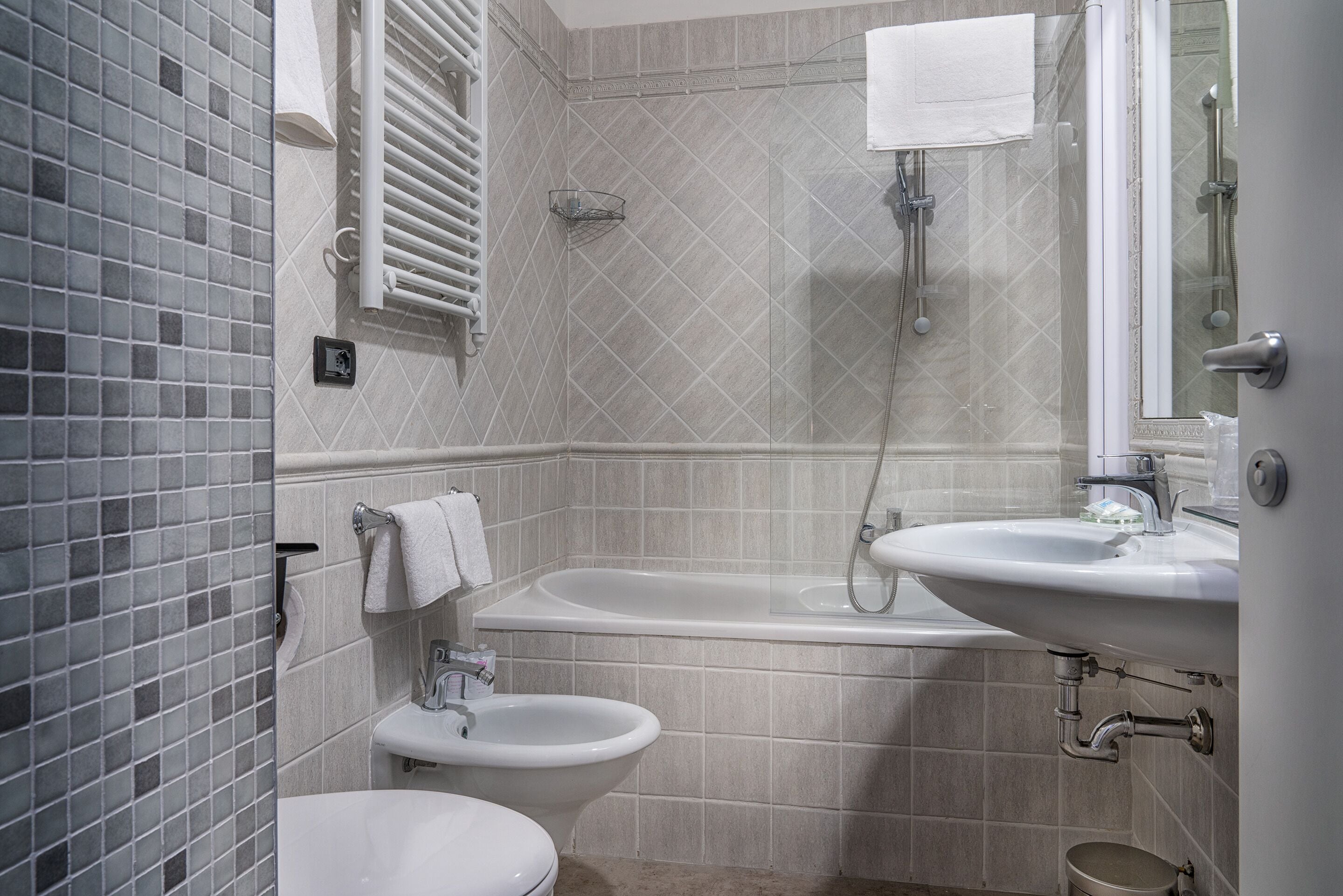 superior double or twin room | bathroom | rainfall showerhead, free toiletries, hair dryer, bidet