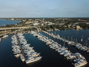 Stunning marina views with yachts and sailboats docked in a well-organized setting.