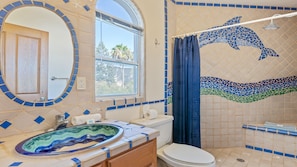 Shower, hair dryer, towels