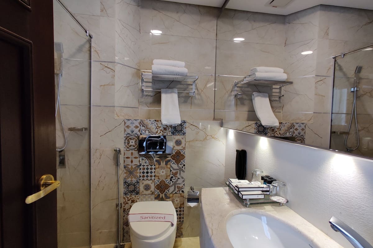 royal suite, multiple beds, smoking | bathroom | free toiletries, hair dryer, bathrobes, slippers