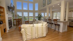 Flat-screen TV, fireplace, DVD player, foosball