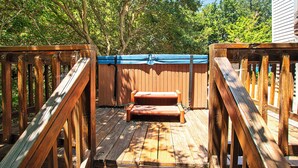 A wooden deck with a bench and a fence. - Oceanside, Private Pool, Hot Tub, Screened Porch, WC940, Whalin (Corolla)