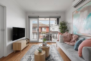 Apartment, 1 Bedroom, Non Smoking, Kitchen | Living area | 49-inch LCD TV with cable channels, TV
