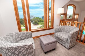 Flat-screen TV, fireplace, DVD player, stereo