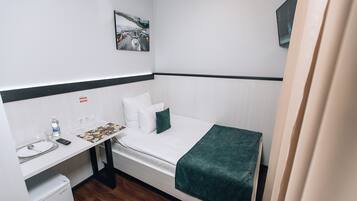 Standard enkelrum | Minibar, skrivbord, gratis wi-fi och sängkläder