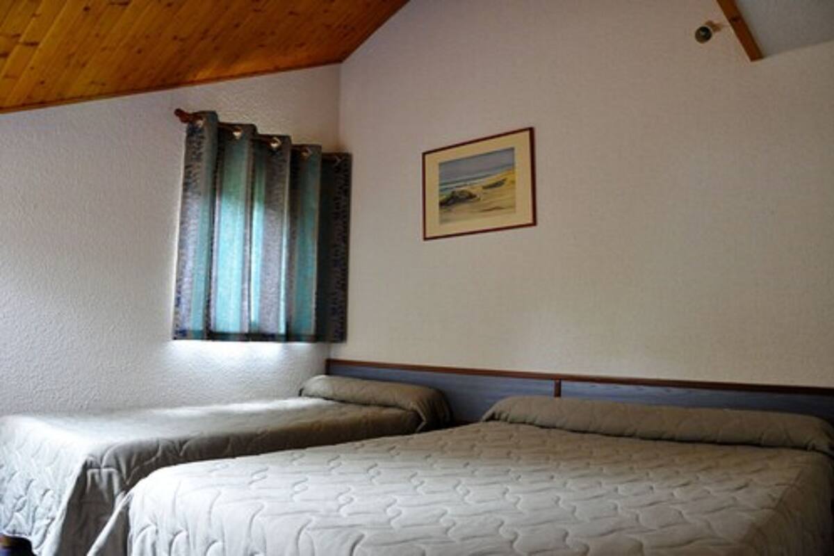 1 bedroom, desk, blackout curtains, cots/infant beds