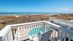 A beach view with a pool and a wooden deck. - OCEANFRONT, 9 BRs, Private Pool, Theater Rm, Rec Rm, Ocean Views, PI134, Heavenly Dayz (Corolla)
