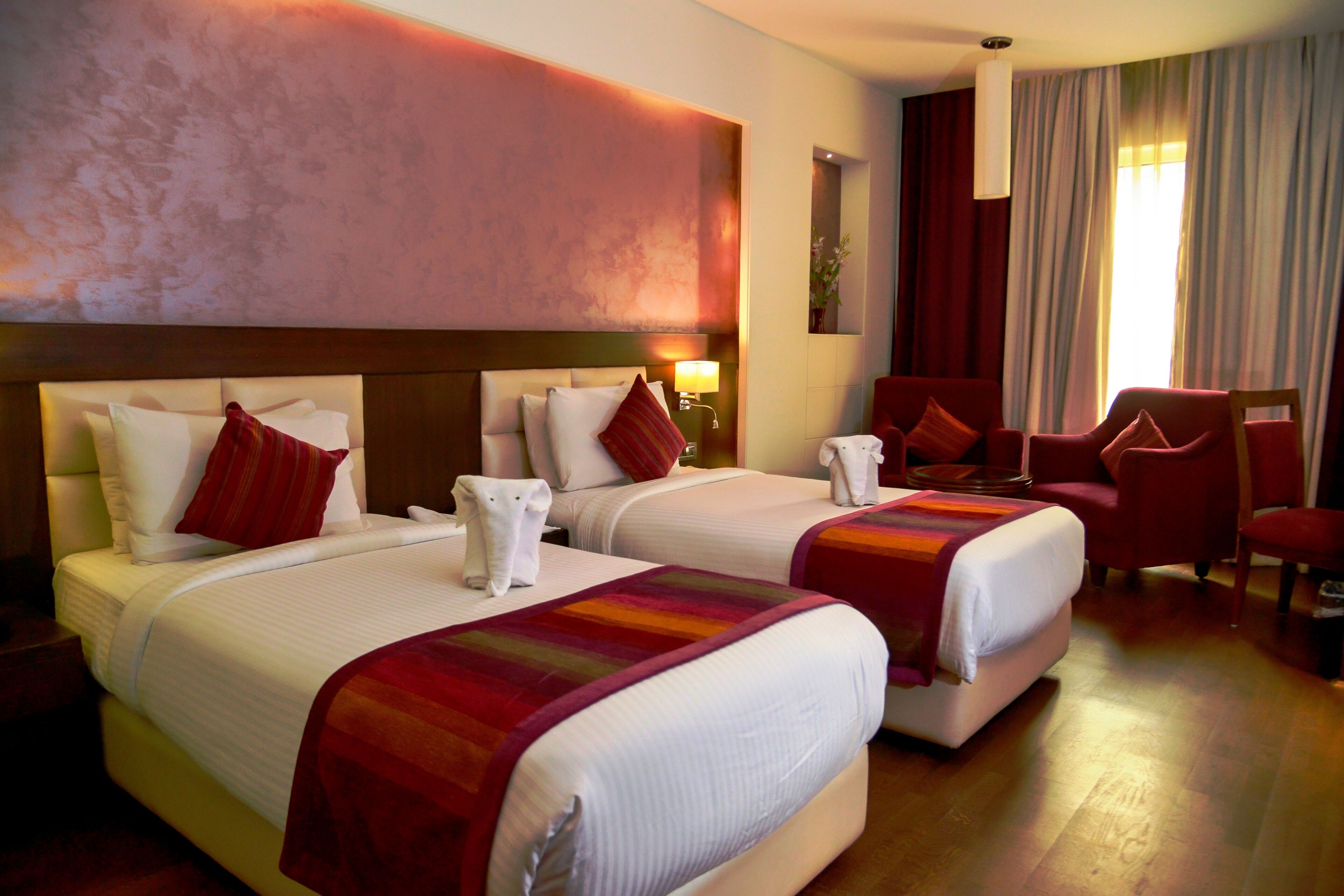 premium twin room, 2 single beds | in-room safe, desk, laptop workspace, blackout curtains